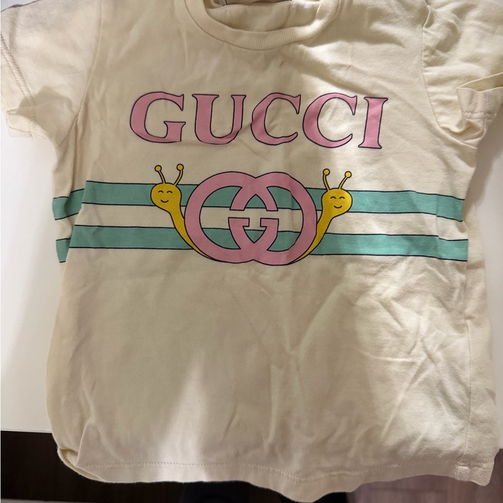 Gucci Kids Cream Tee with Pink and Green Snail Design